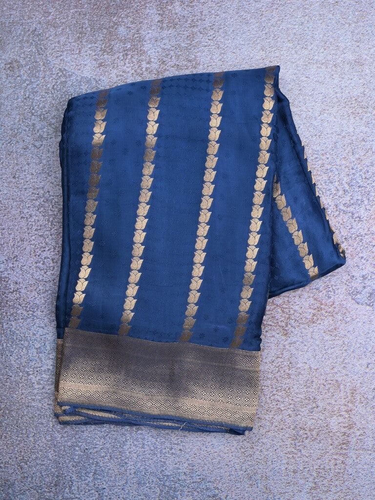 Crape fancy saree royal blue color allover zari weaves & zari border with zari pallu and plain blouse