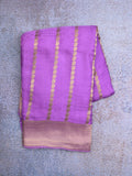 Crape fancy saree purple color allover zari weaves & zari border with zari pallu and plain blouse