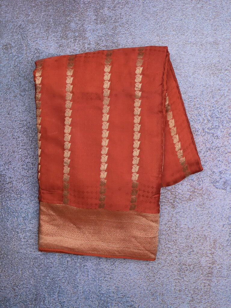 Crape fancy saree orange color allover zari weaves & zari border with zari pallu and plain blouse