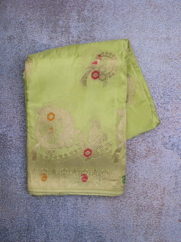 Tabby silk fancy saree light green color allover zari weaves & zari border with zari pallu and attached plain blouse