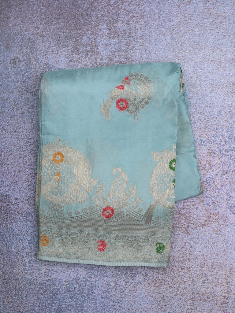 Tabby silk fancy saree light blue color allover zari weaves & zari border with zari pallu and attached plain blouse