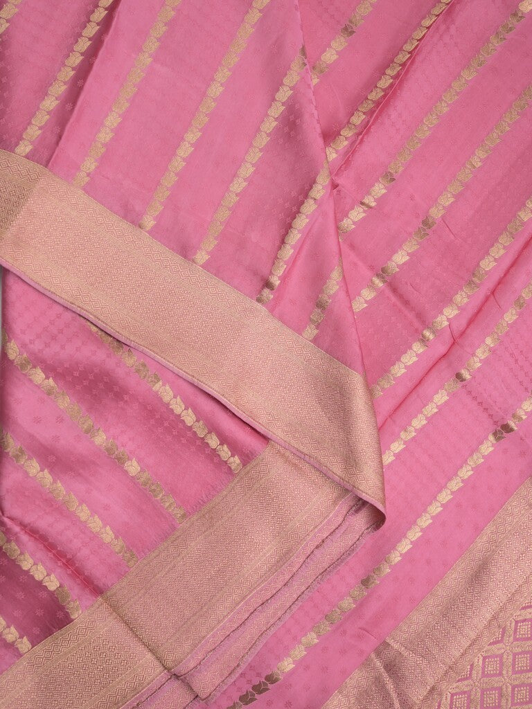 Crape fancy saree baby pink color allover zari weaves & zari border with zari pallu and plain blouse