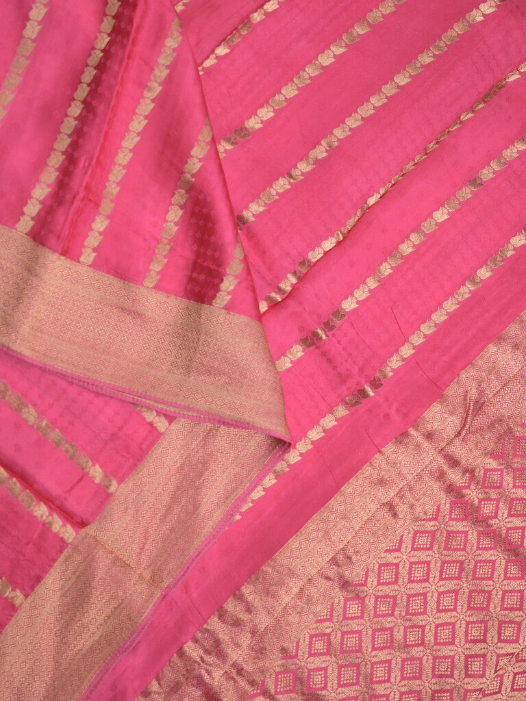 Crape fancy saree light pink color allover zari weaves & zari border with zari pallu and plain blouse