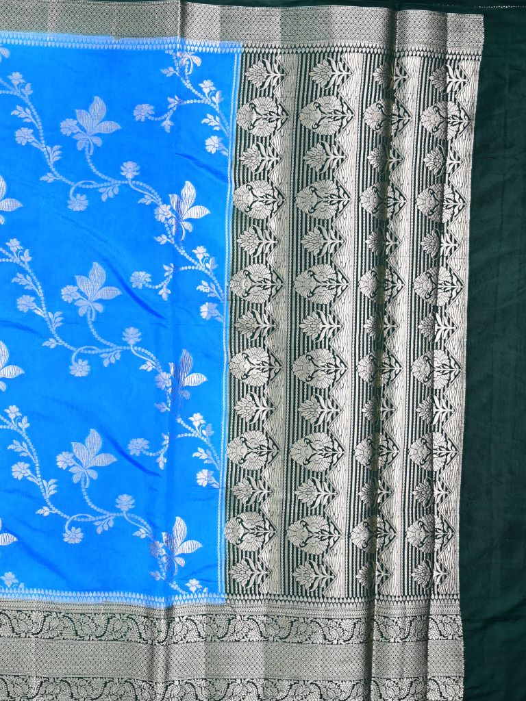 Dupion fancy saree sky blue color allover zari weaves & zari border with rich pallu contrast brocade blouse