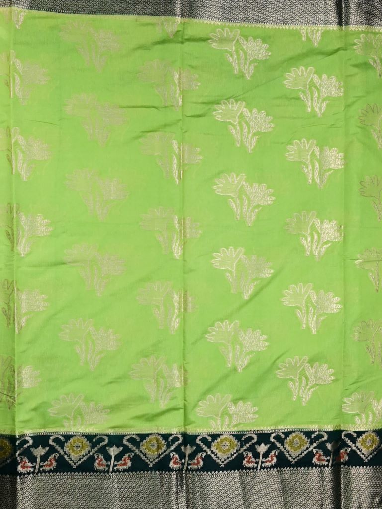 Dupion fancy saree light green color allover zari weaves & zari border with rich pallu contrast brocade blouse