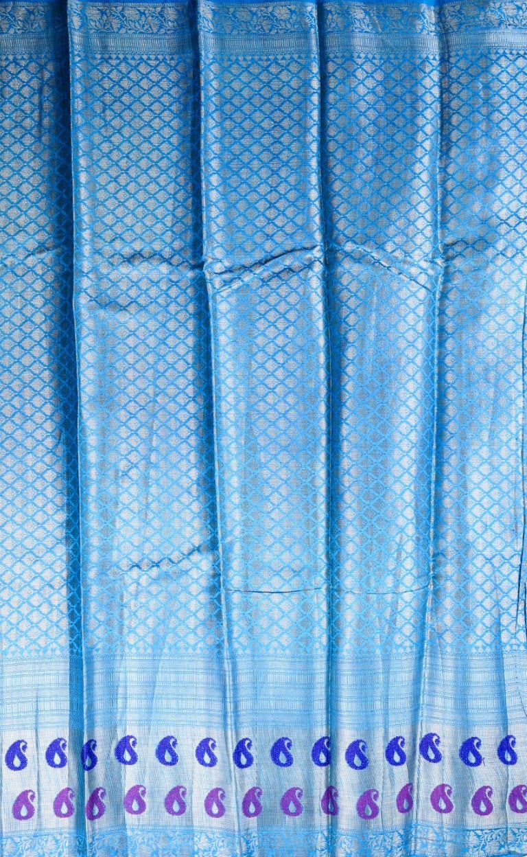Matka jute saree green and blue color with allover digital prints with antique zari motives, short pallu, zari border, and brocade blouse