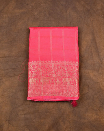 Dola silk saree pink color with allover zari checks, big zari border, short pallu and brocade blouse