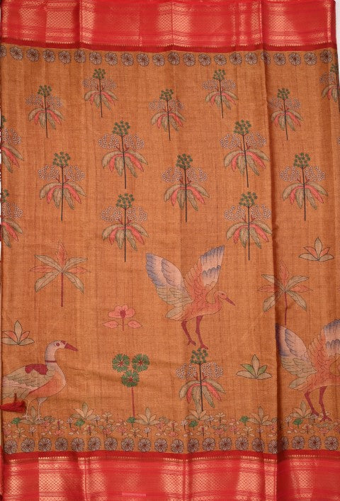 Tussar fancy saree brown color allover digital kalamkari prints and zari weaving border with printed pallu and plain blouse