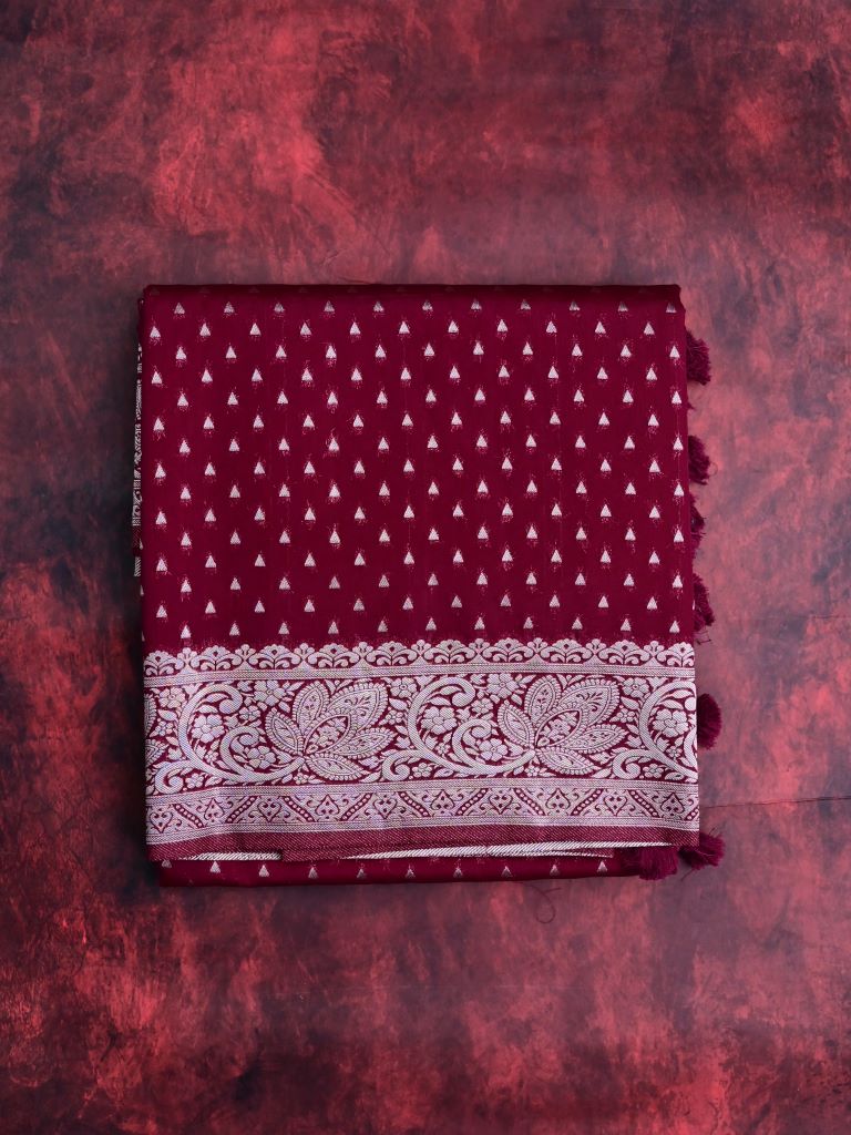 Dupion fancy saree maroon color allover zari motifs & silver zari border with rich pallu and brocade blouse