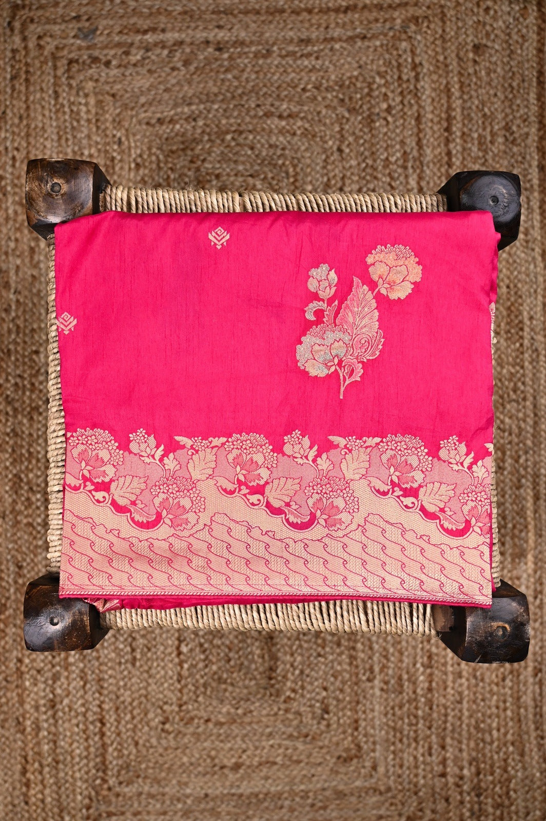 Dola silk saree dark pink color with allover meenakari motives, rich pallu, small zari border and running plain blouse.