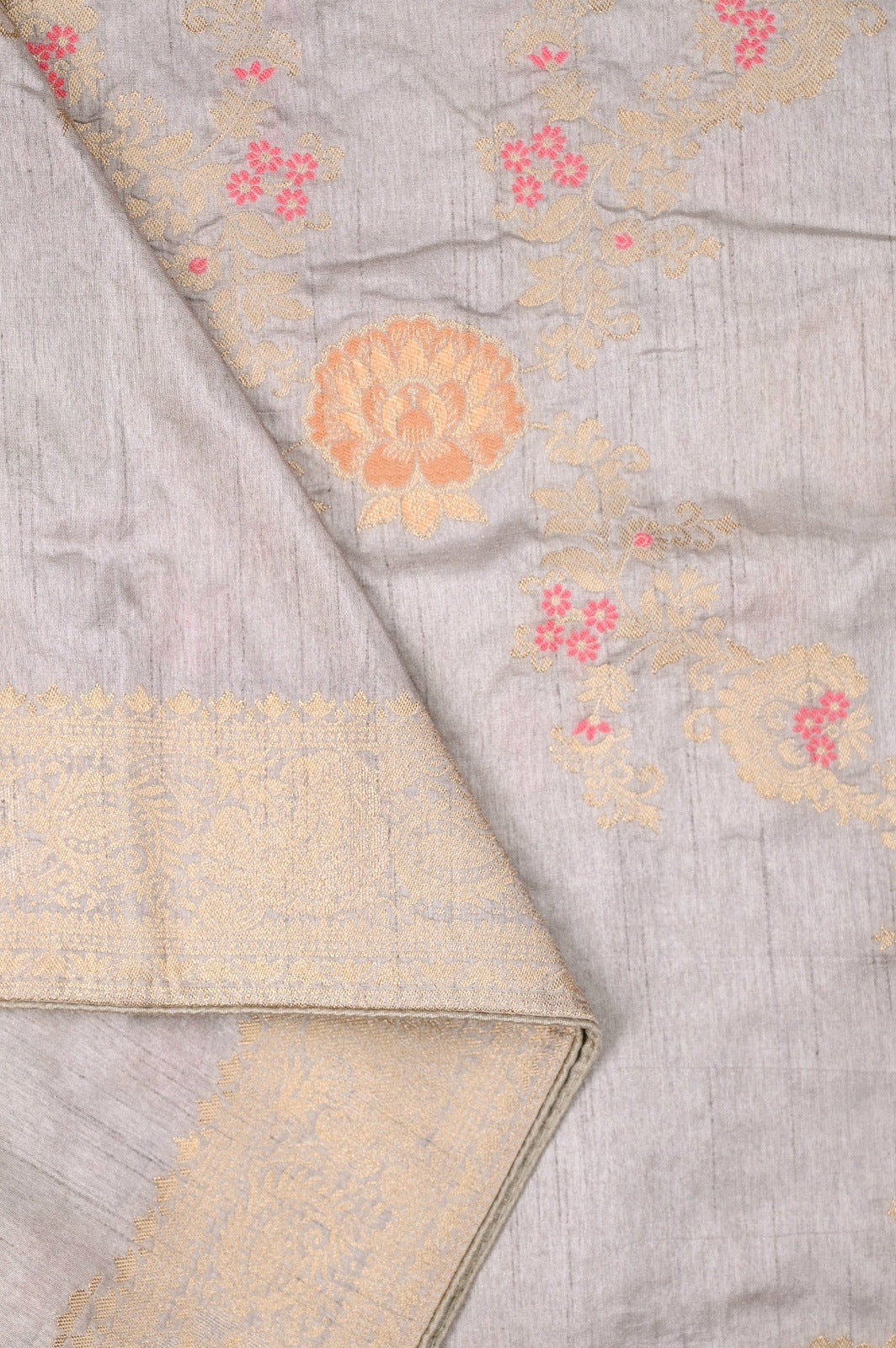 Dola silk saree ash color with allover meenakari work, rich pallu, small zari border and running plain blouse.