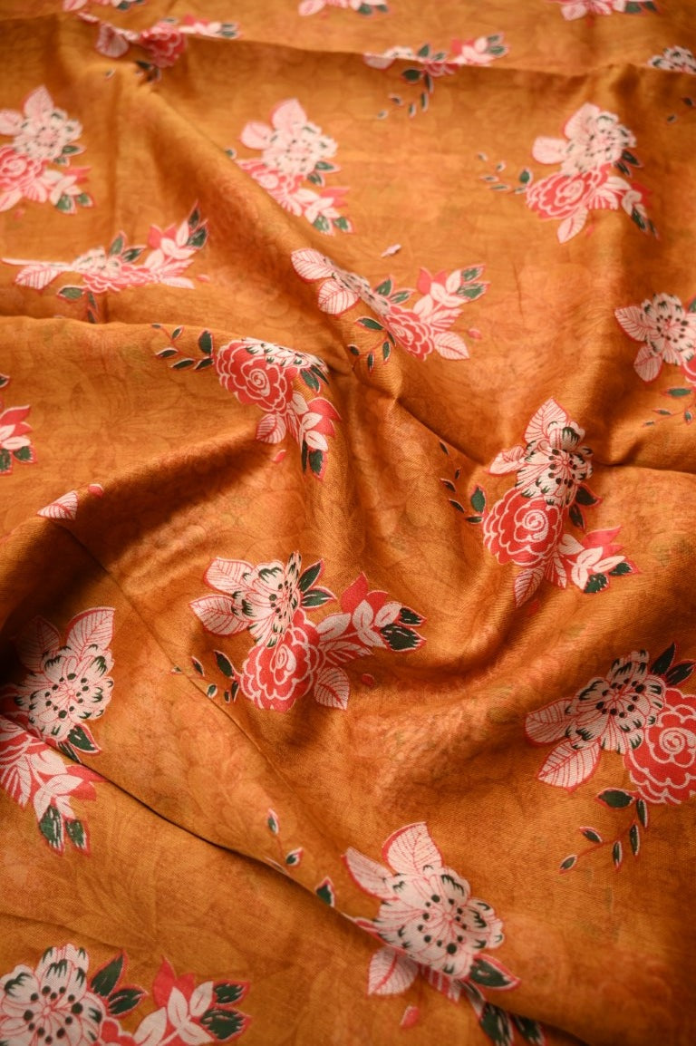 Tussar matka fancy saree orange color allover floral prints and zari weaving border with short pallu and plain blouse