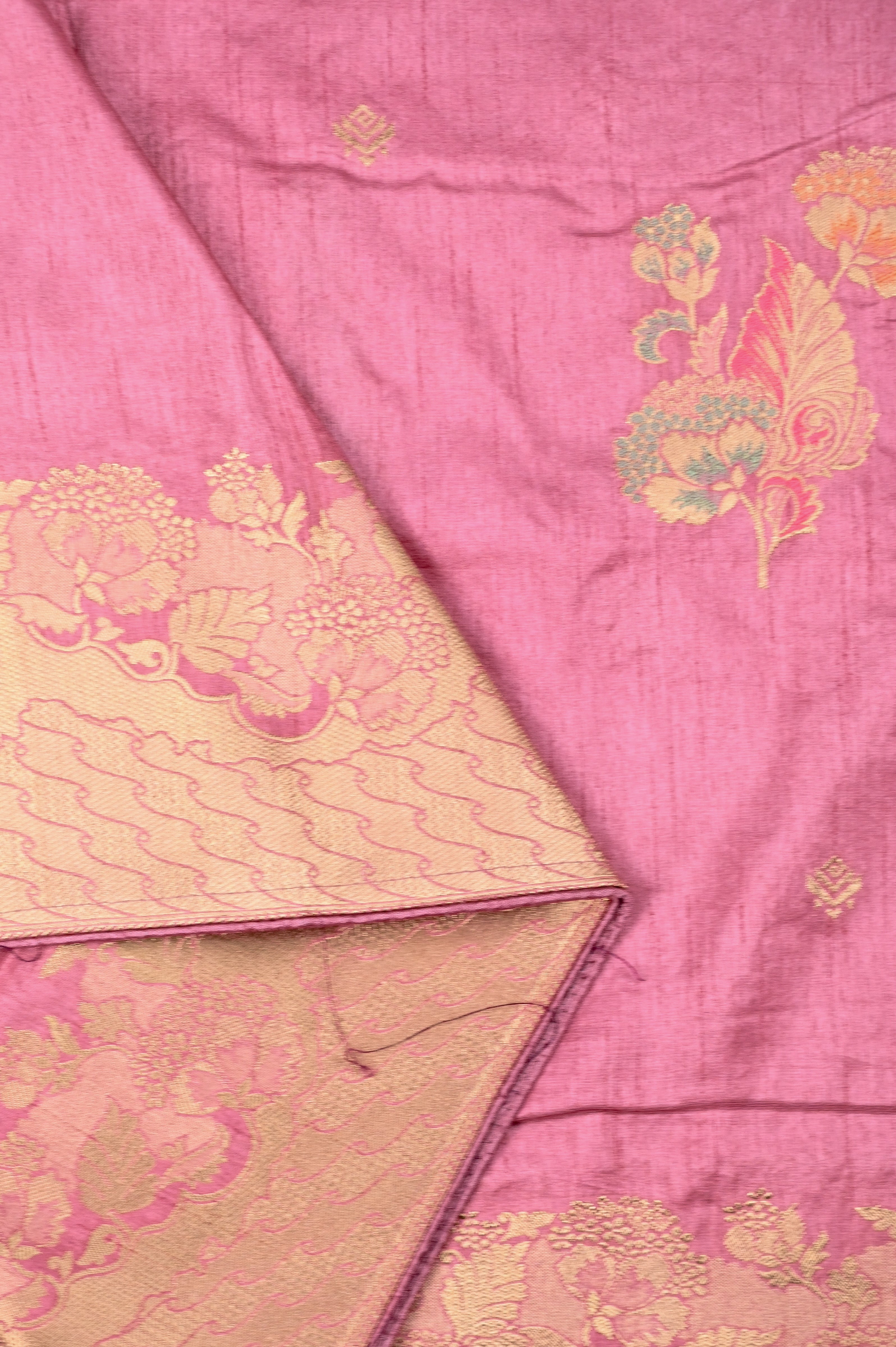 Dola silk saree baby pink color with allover meenakari motives, rich pallu, small zari border and running plain blouse.