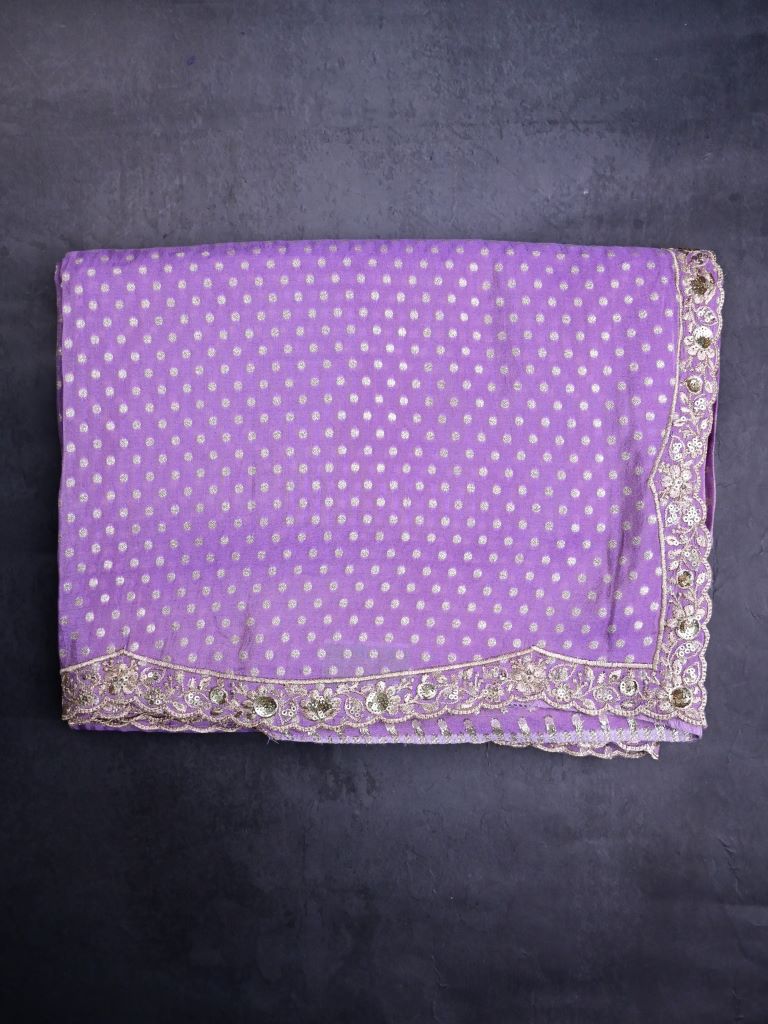 Dola tissue fancy saree lavender color allover zari motifs & embroidery cutwork border with running pallu and attached blouse