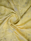 Tabby silk fancy saree light yellow color allover embroidery & cutwork border with running pallu and stitched blouse