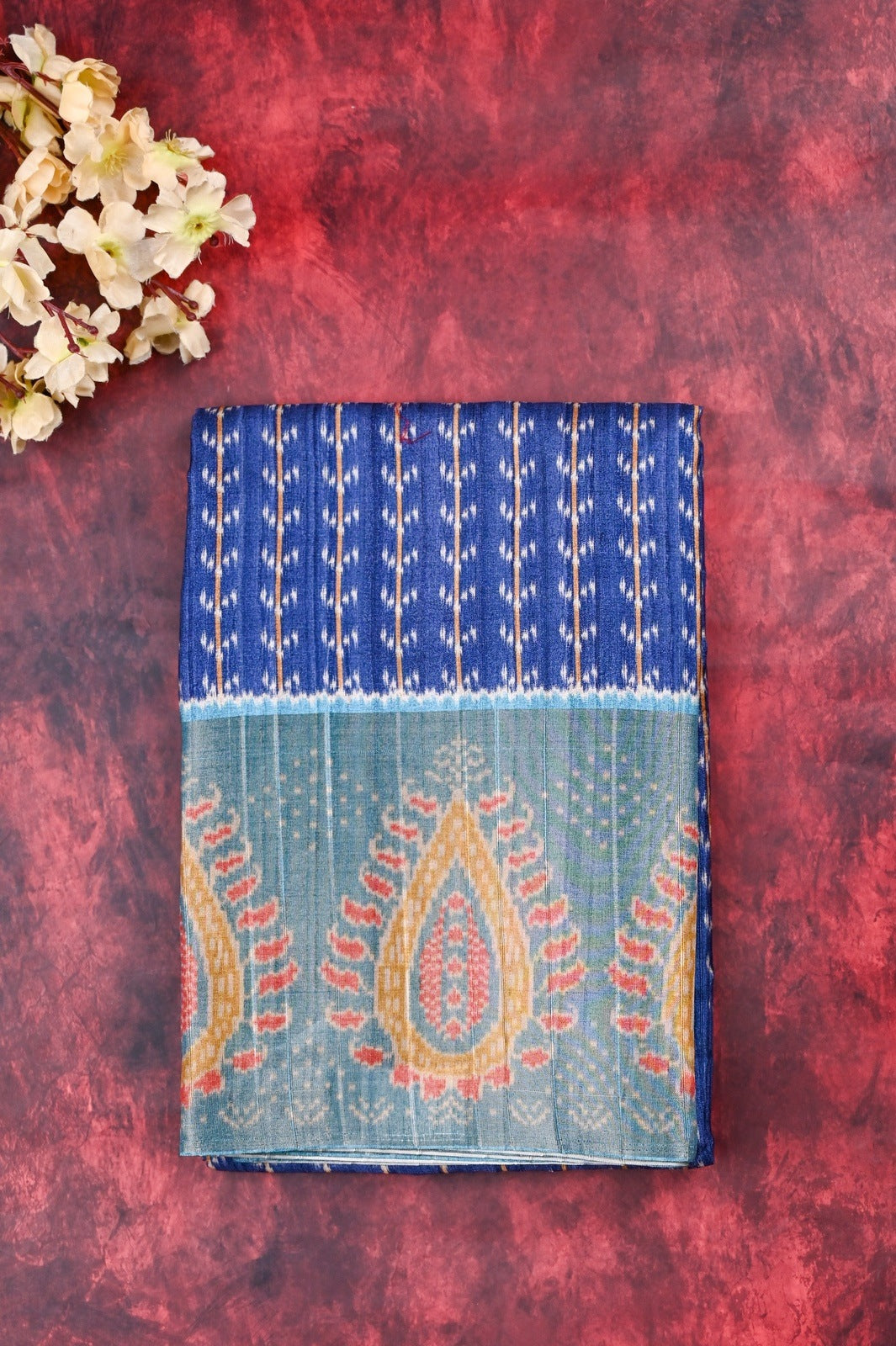 Fancy tussar saree blue color with allover prints, big tissue border with printed pallu and blouse