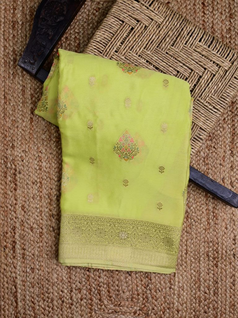 Chinnon fancy saree light green color allover zari weaves & zari border with rich pallu and plain self blouse