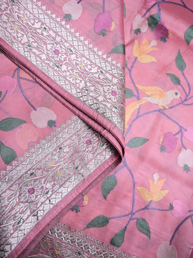 Organza tissue saree onion pink color allover weaves & zari border with running pallu and attached plain blouse