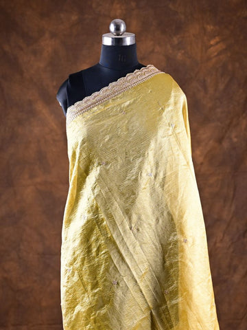 Tissue dupatta golden yellow color with allover motifs and embroidery cutwork border