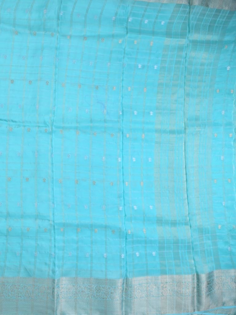 Tabby silk fancy saree sky blue color allover zari checks, motifs & zari border with short pallu and contrast blouse