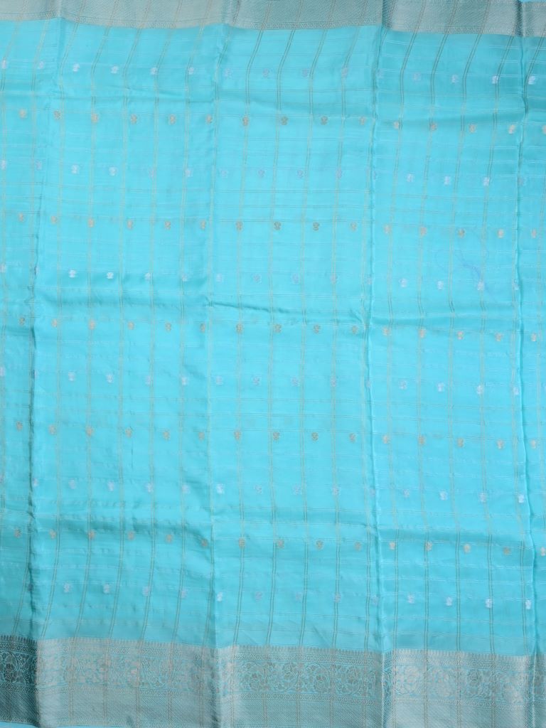 Tabby silk fancy saree sky blue color allover zari checks, motifs & zari border with short pallu and contrast blouse