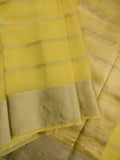 Organza fancy saree lemon yellow color allover zari stripes & zari border with short pallu and running blouse