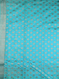 Dupion fancy saree sky blue color allover zari weaves & ikkath zari border with rich pallu and attached self blouse