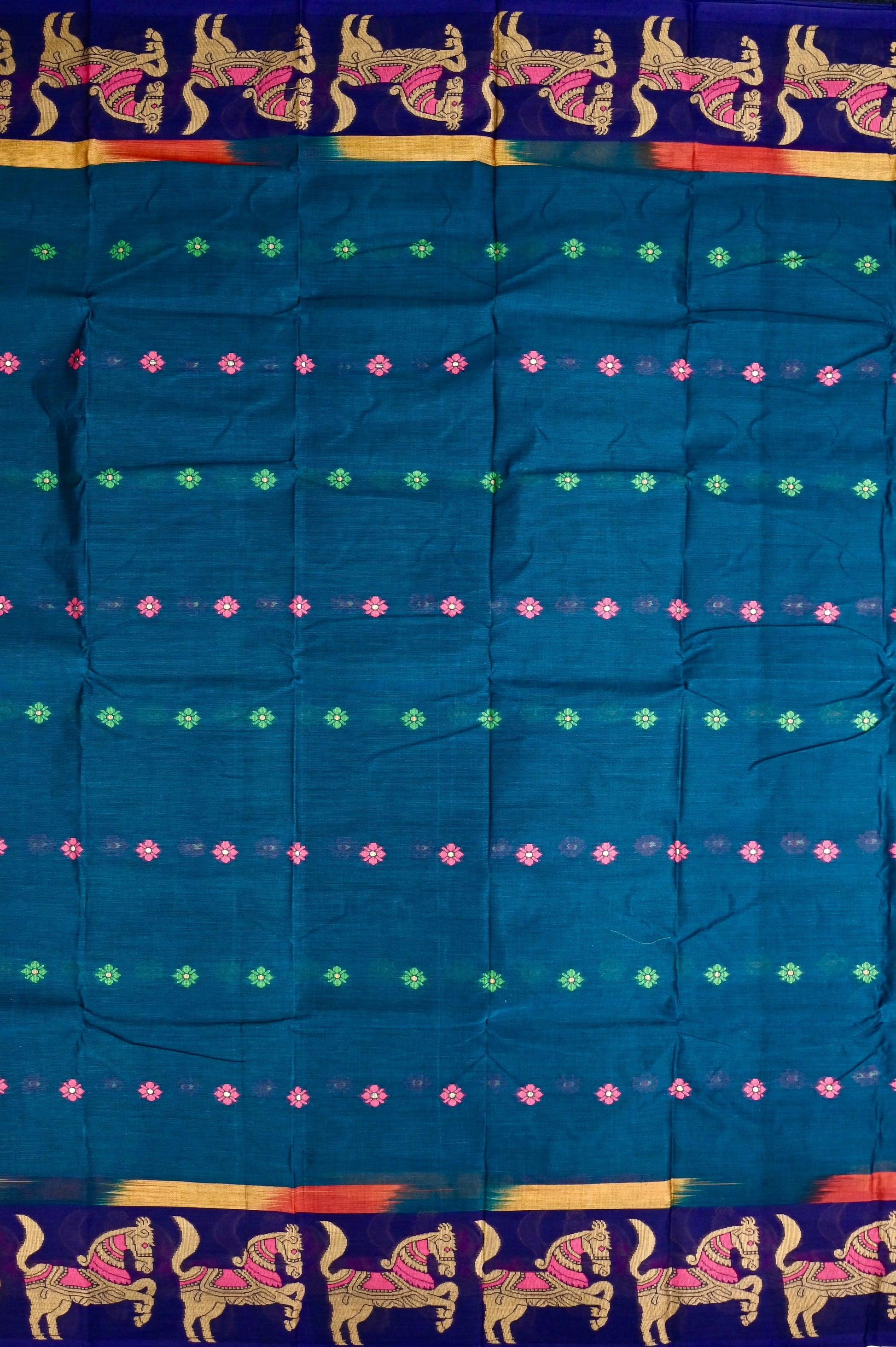 Dhaka cotton peacock green and blue color with allover thread motives, thread border, contrast pallu and running blouse.