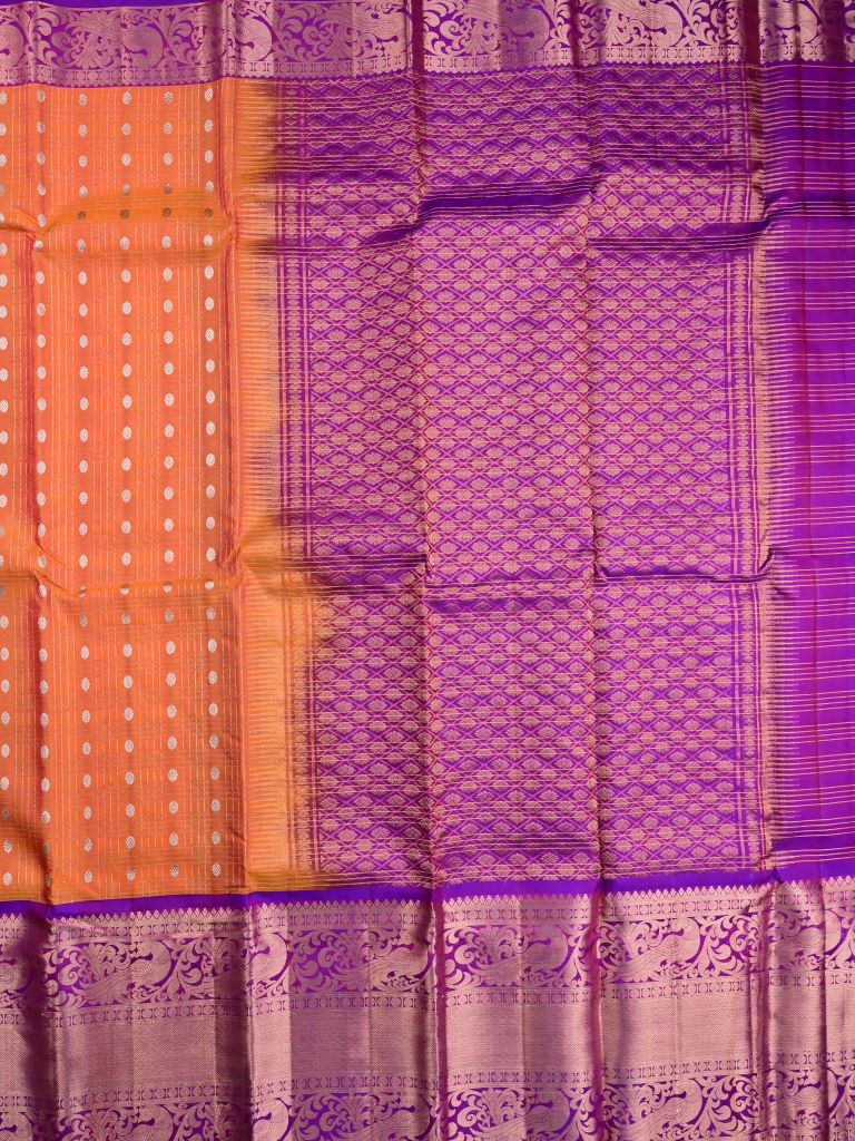 Kanchi pattu saree orange color allover zari motifs & kanchi border with rich pallu and contrast blouse