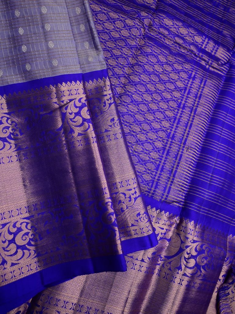 Kanchi pattu saree light lavender color allover zari motifs & kanchi border with rich pallu and contrast blouse