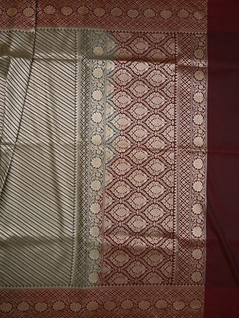 Banaras pattu saree grey color allover zari stripes & zari weaving border with rich pallu and contrast plain blouse