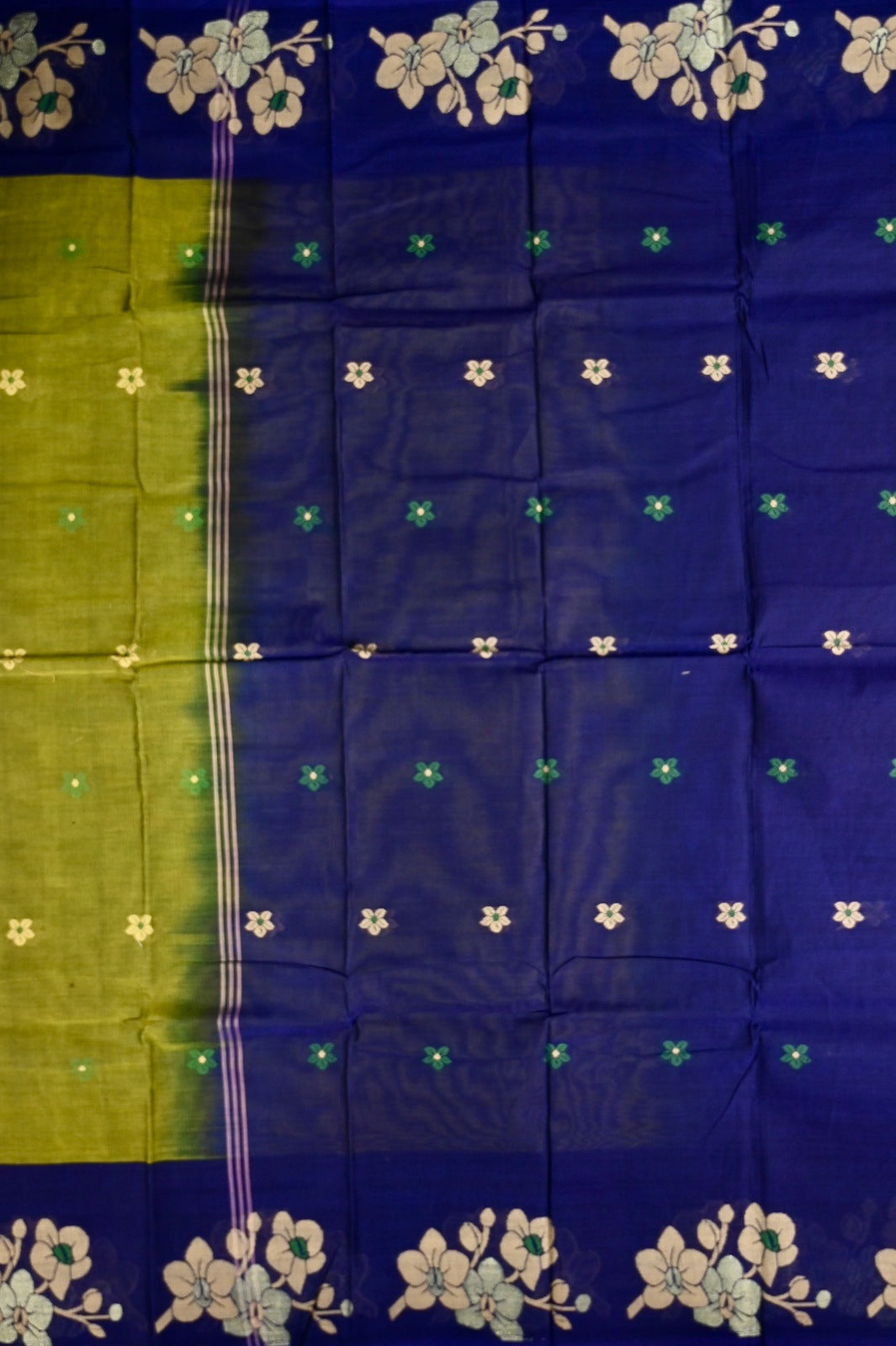 Dhaka cotton light green and blue color with allover thread motives, thread border, contrast pallu and running blouse.
