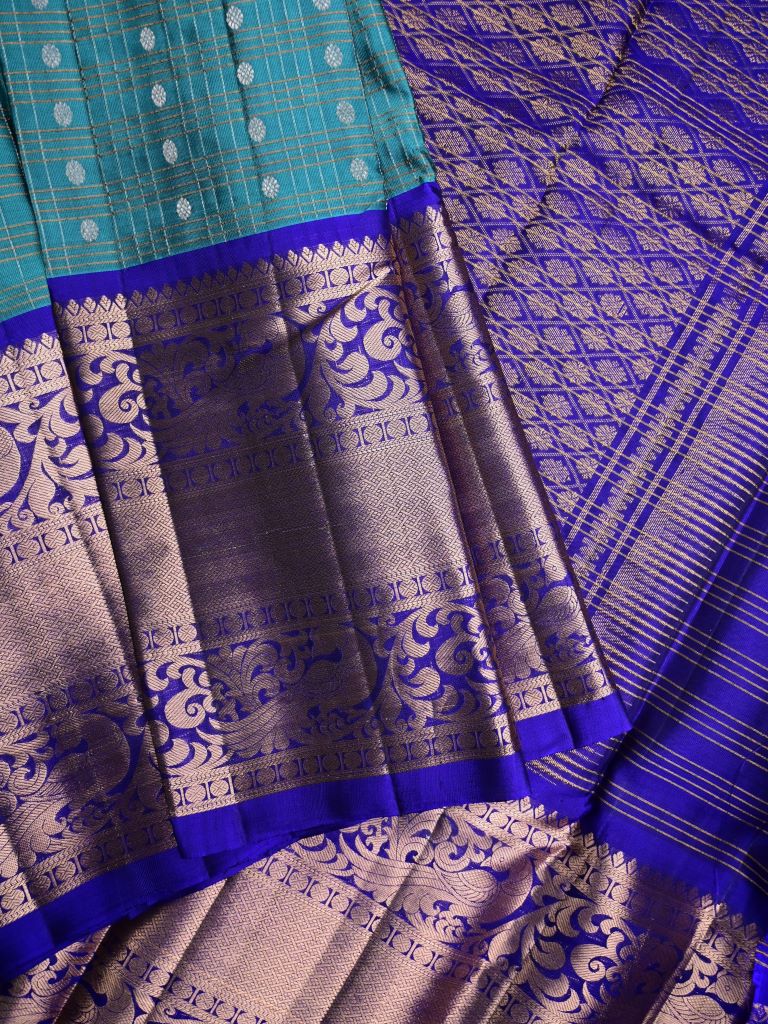 Kanchi pattu saree sky blue color allover zari motifs & kanchi border with rich pallu and contrast blouse