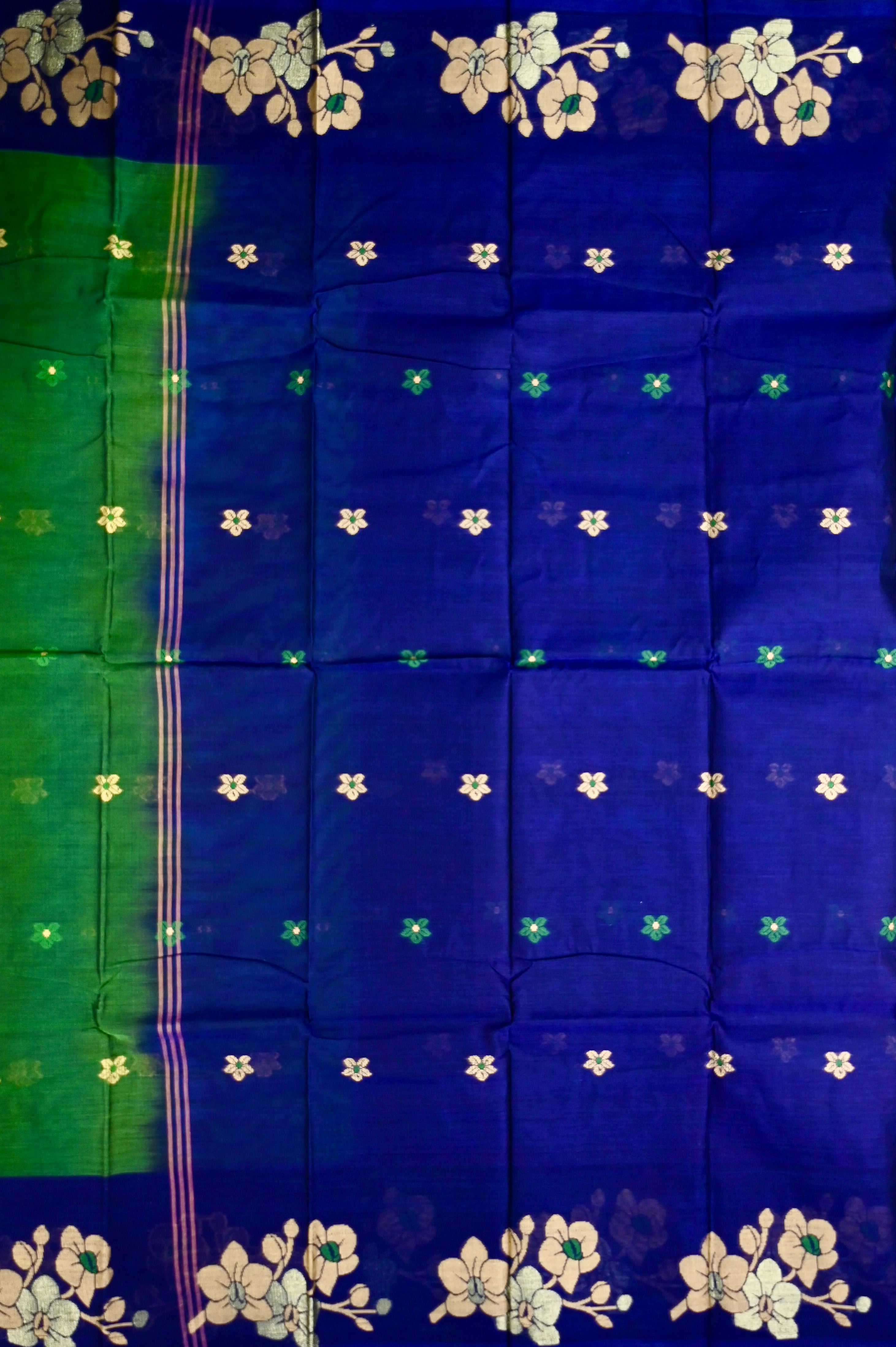 Dhaka cotton bottle green and blue color with allover thread motives, thread border, contrast pallu and running blouse.