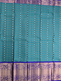 Kanchi pattu saree peacock blue color allover zari motifs & kanchi border with rich pallu and contrast blouse