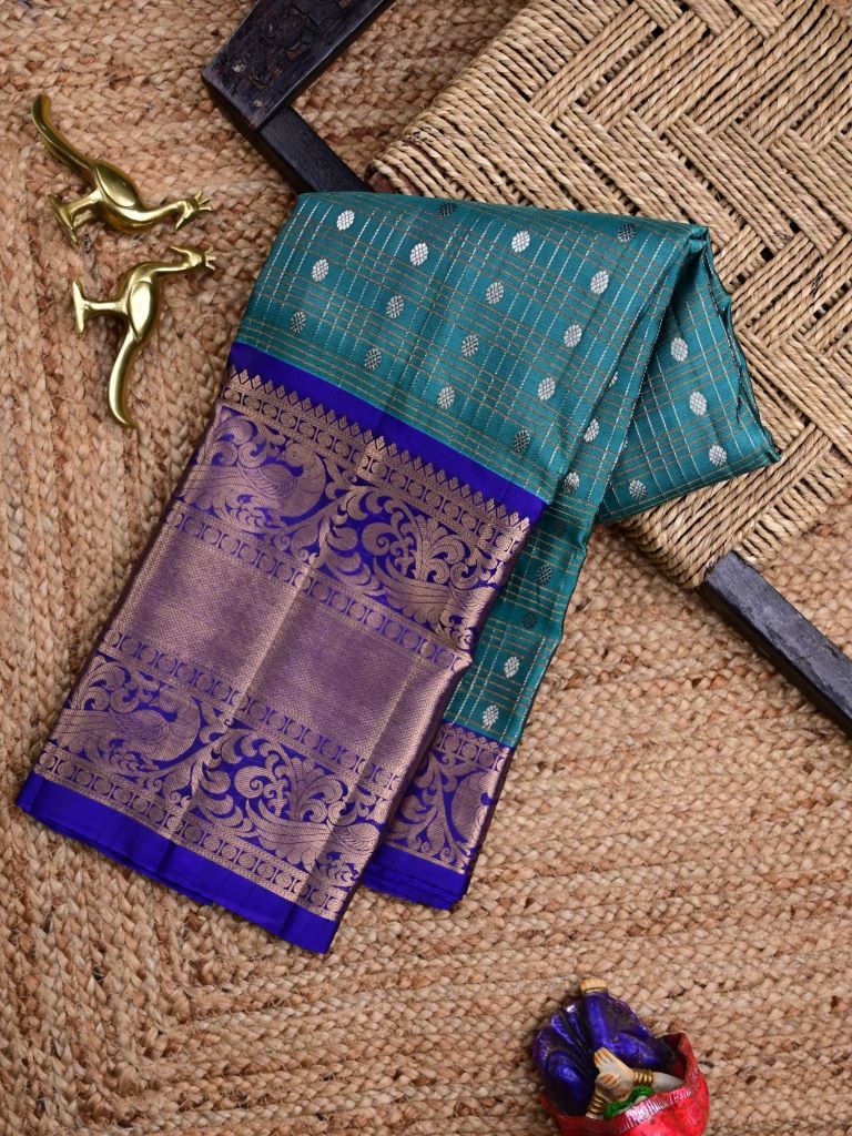 Kanchi pattu saree peacock blue color allover zari motifs & kanchi border with rich pallu and contrast blouse