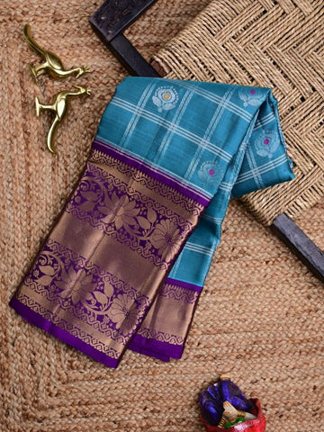 Kanchi pattu saree sky blue color allover zari motifs & kanchi border with rich pallu and contrast blouse