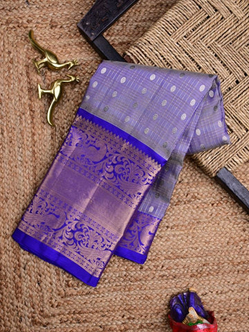 Kanchi pattu saree light lavender color allover zari motifs & kanchi border with rich pallu and contrast blouse