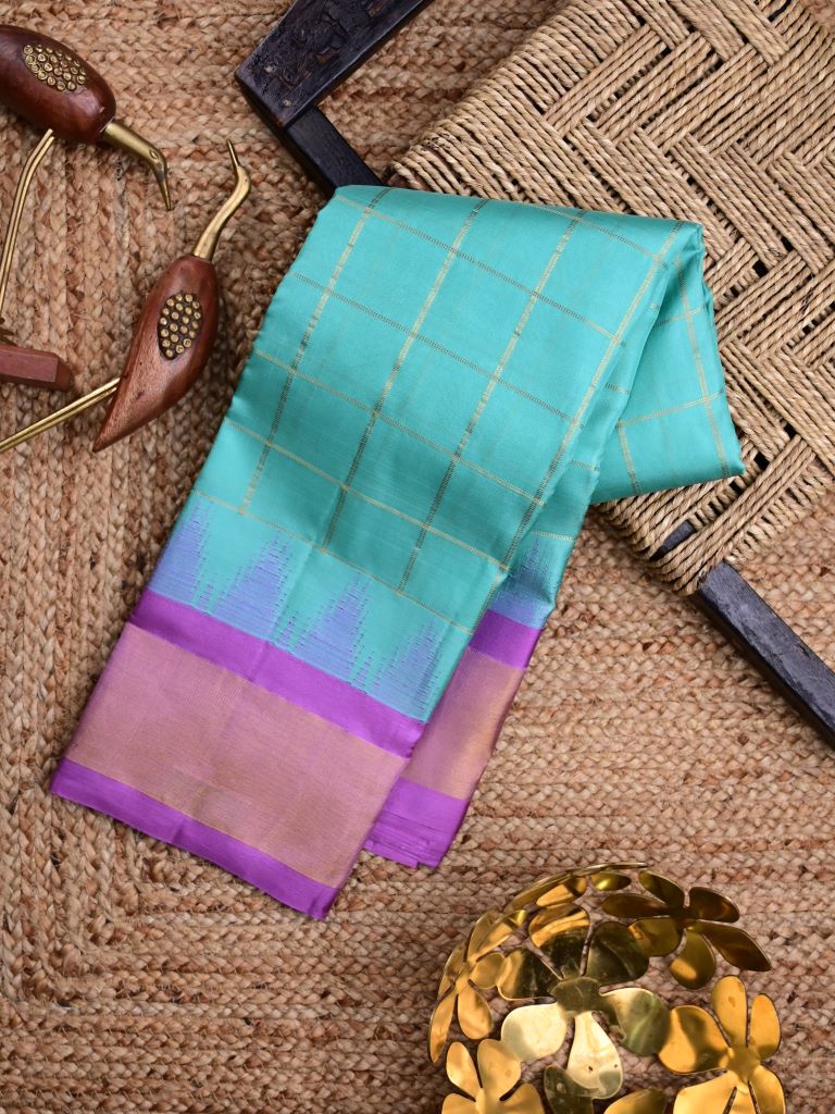 Gadwal pattu saree sky blue color allover checks & small kaddi border with rich contrast pallu and attached plain blouse