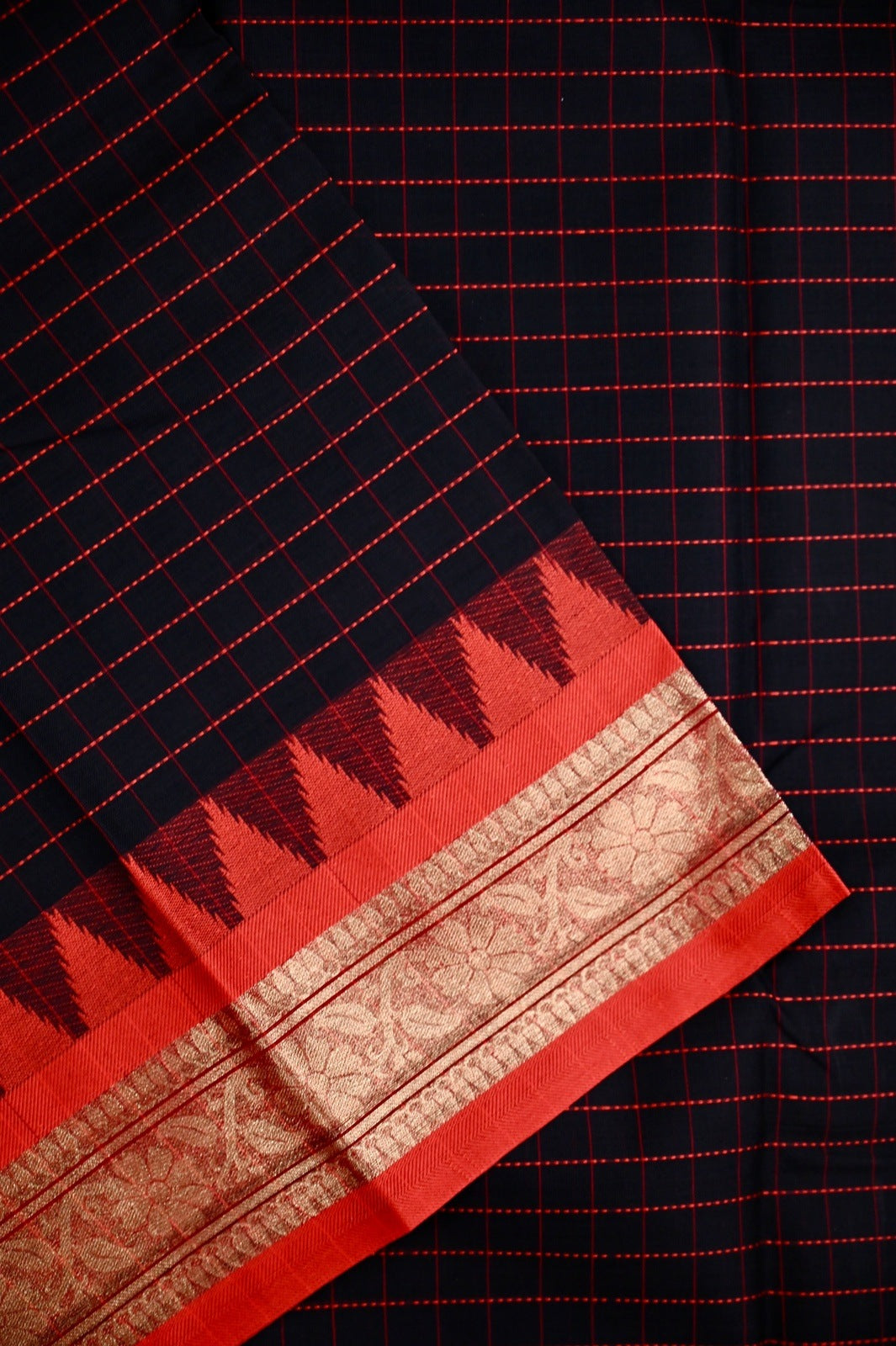 Dhaka cotton black and red color with allover checks, small zari border, short pallu and contrast checks blouse