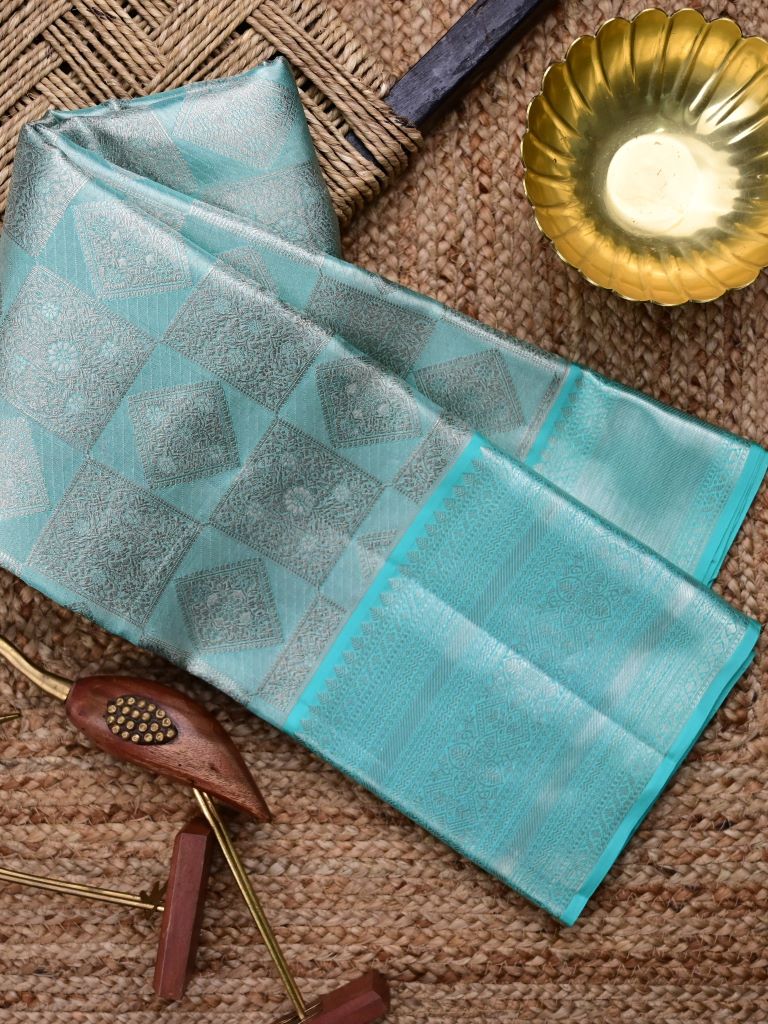 Kanchi tissue pattu bridal saree light blue color allover zari weaving & zari border with rich pallu and attached plain blouse