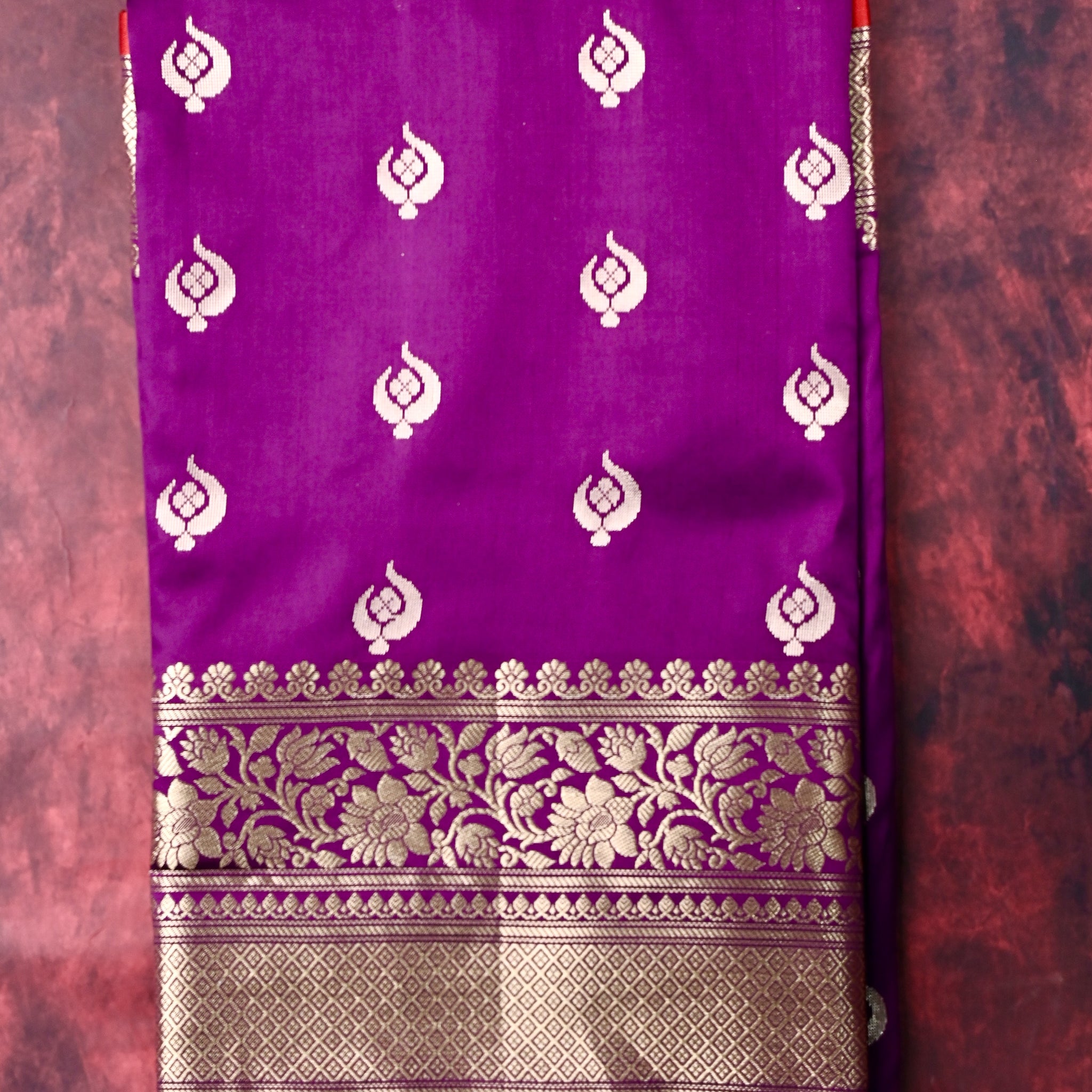 Banaras saree purple color with allover zari motive weaves, contrast pallu, big zari border and plain blouse.