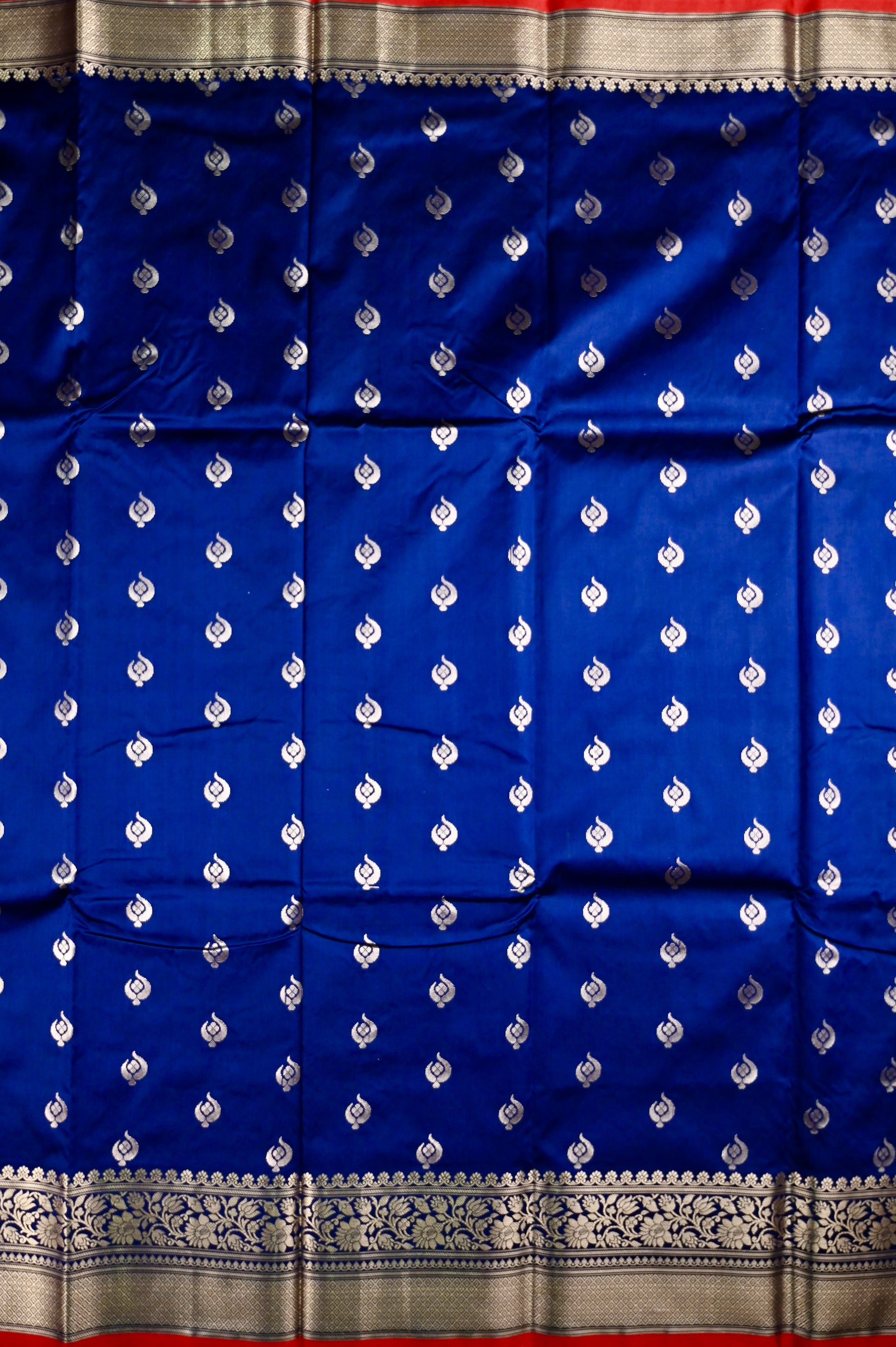 Banaras saree royal blue color with allover zari motive weaves, contrast pallu, big zari border and plain blouse.