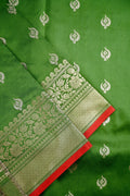 Banaras saree light green color with allover zari motive weaves, contrast pallu, big zari border and plain blouse.