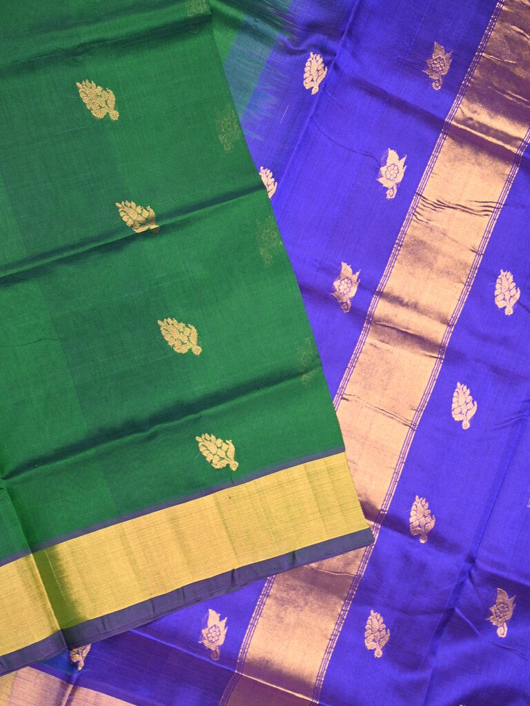 Uppada seiko pattu saree bottle green color allover zari motifs & kaddi border with zari contrast pallu and attached plain blouse