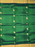 Uppada seiko pattu saree bottle green color allover zari motifs & kaddi border with zari contrast pallu and attached plain blouse