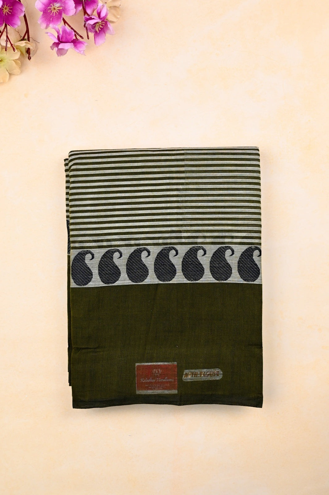Kanchi cotton saree black color with allover lines, big kaddi border, short pallu and running blouse.