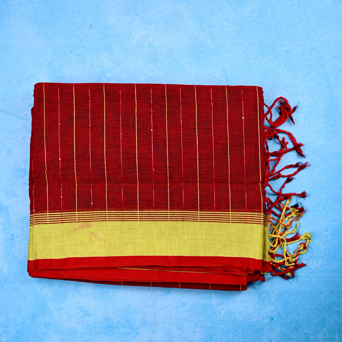 Jute cotton saree red color with all over thread lines with sequence, big pallu, small contrast border and plain blouse.