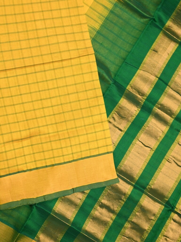 Uppada seiko pattu saree yellow color allover checks & kaddi border with zari contrast pallu and attached plain blouse