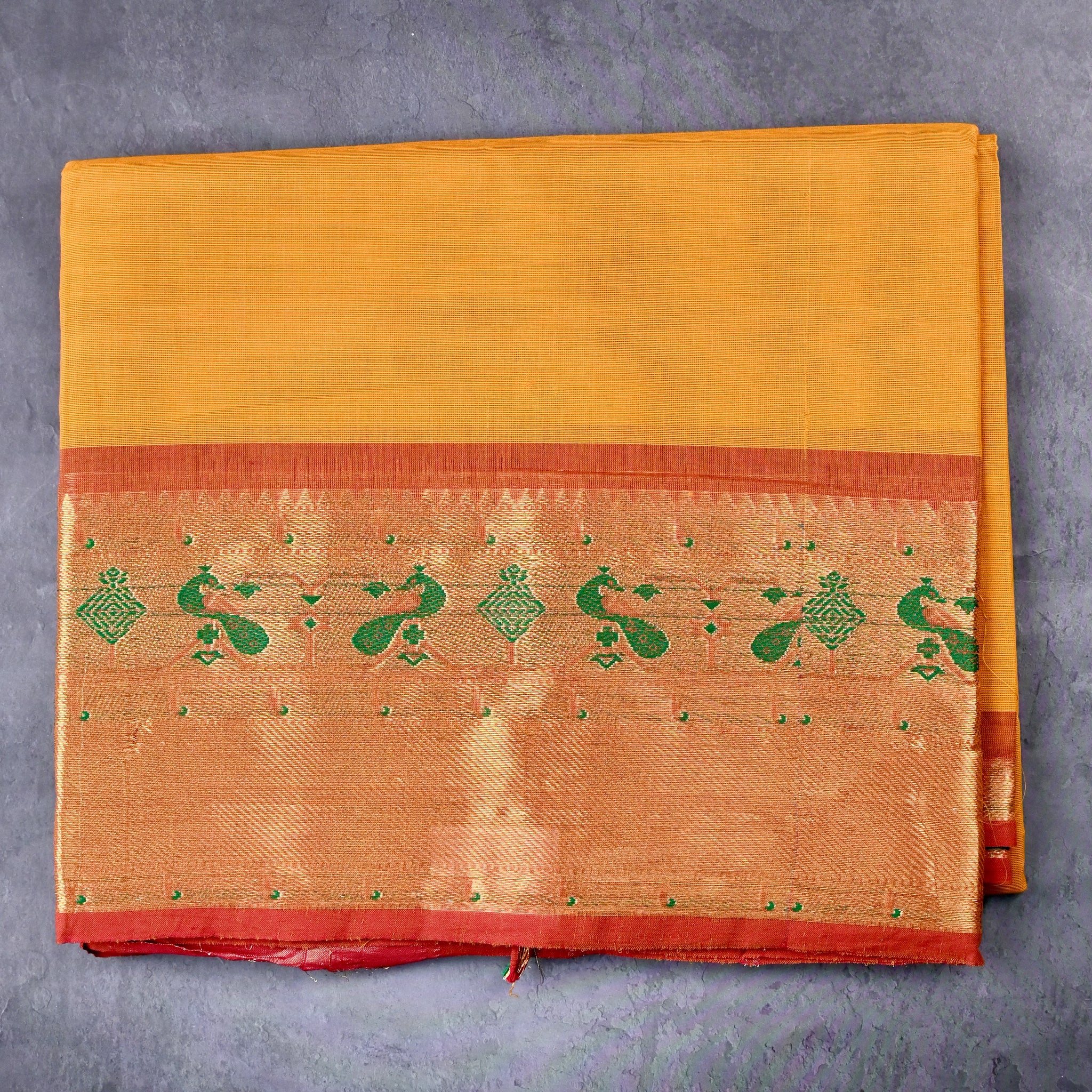 Kanchi cotton saree musturd yellow color with big gold zari kanchi border, short pallu and running plain blouse.